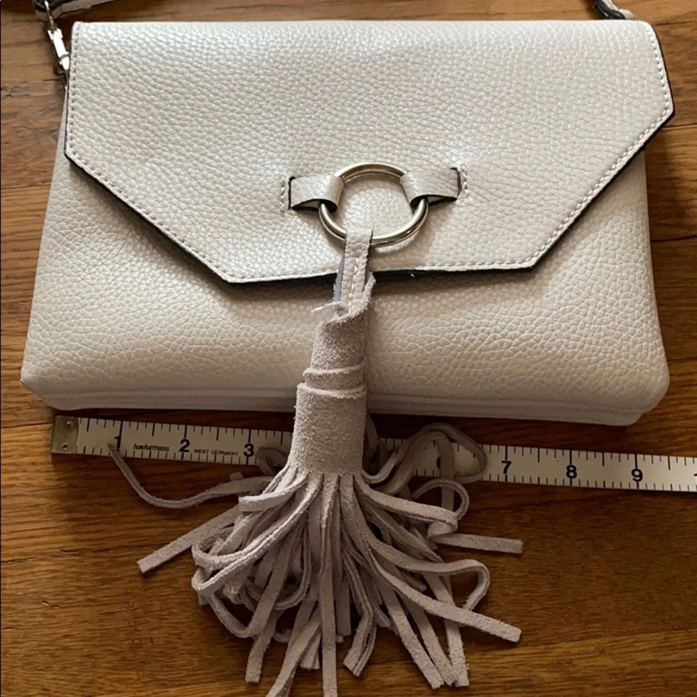 White vegan leather crossbody purse with tassel